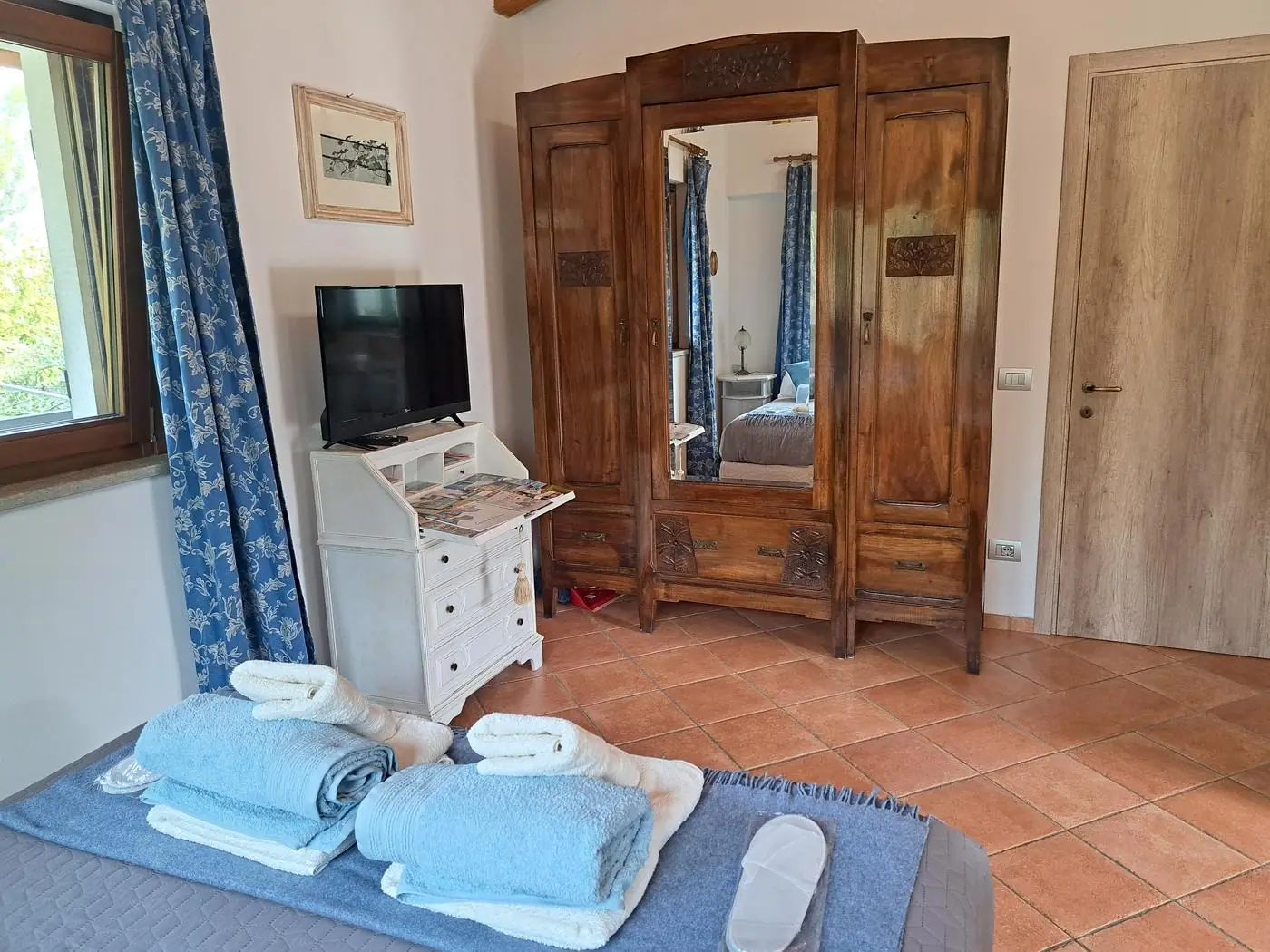 Antique three-door wardrobe and drop-front desk